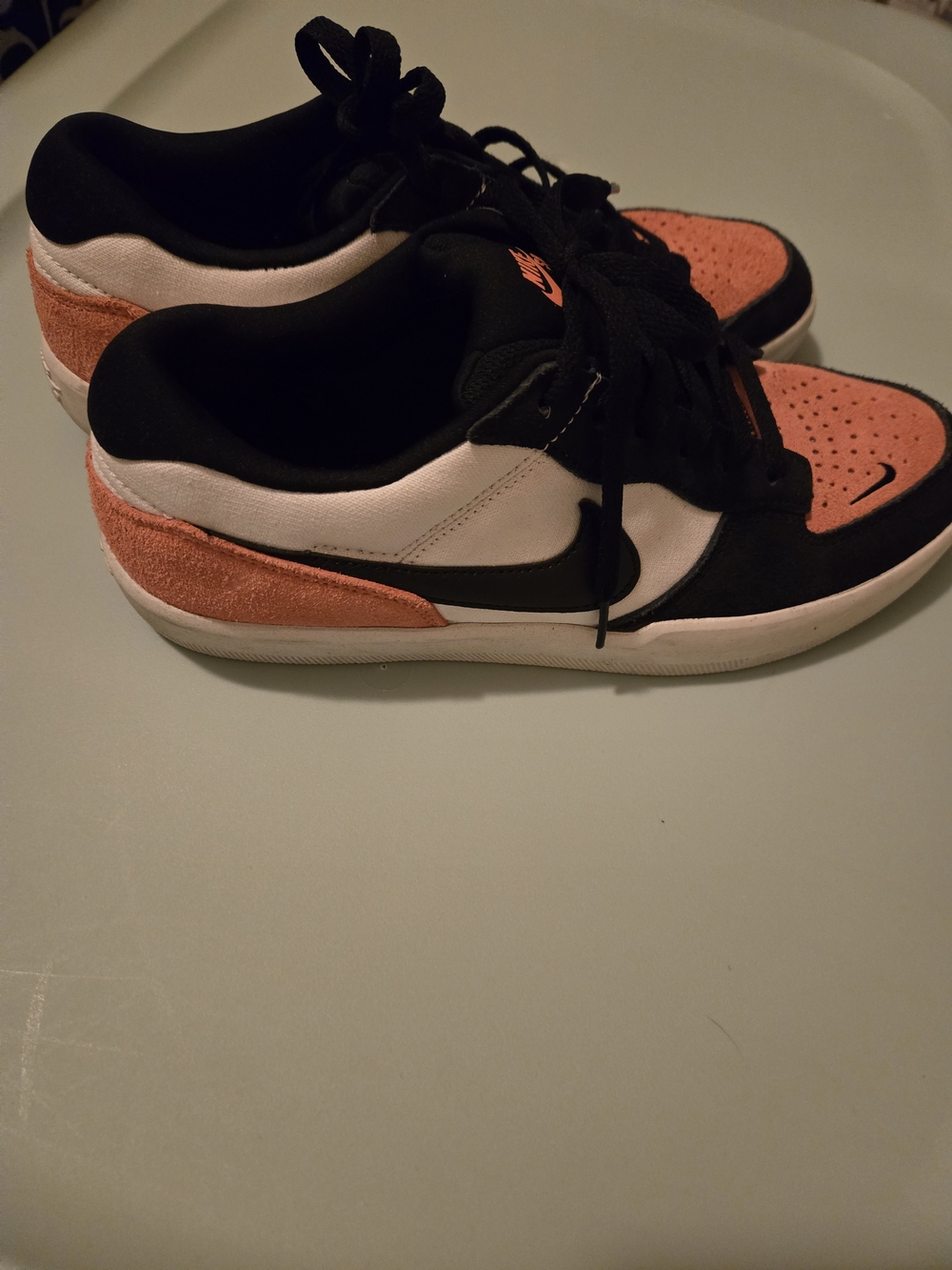Nike Womenβs Low-Top Sneakers in Coral, Black & White
